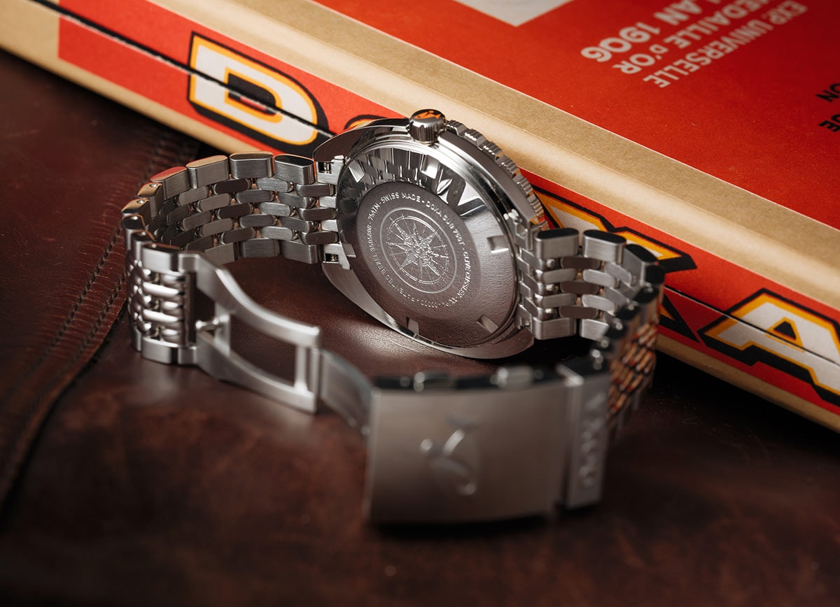 Doxa 750T pozadina